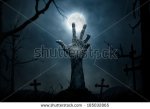 stock-photo-halloween-concept-zombie-hand-rising-out-from-the-ground-185032865.jpg